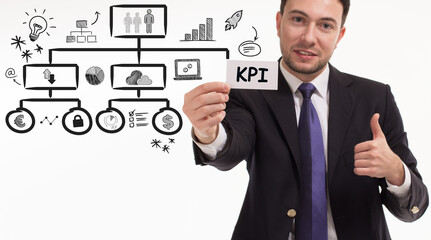 Business, technology, internet and network concept. Young businessman thinks over the steps for successful growth: KPI