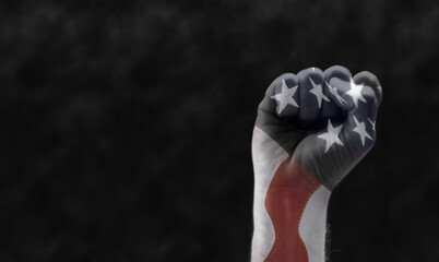 fist with american flag in transparency. concept for black lives matter protest agains racism and...