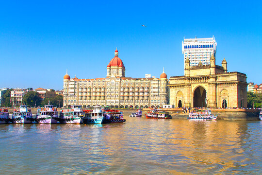The Gateway of India and boats as seen from the Mumbai Harbour in Mumbai, India