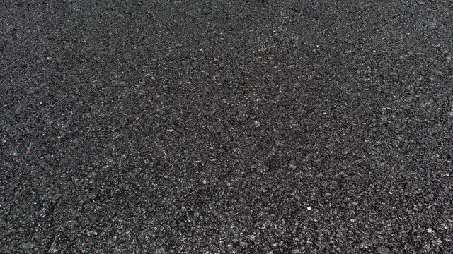 Asphalt road asphalt surface top view close-up with free space
