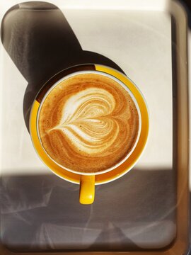 A cup of cafe latte in the morning