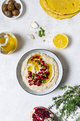 Levantine appetizer Baba ghanoush baked eggplant appetizer served with pomegranate seeds