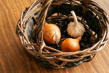 Onions and garlic in an old basket