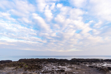 Fototapeta na wymiar lava Beach in the morning on jeju island.