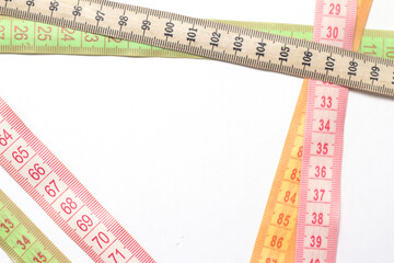 measuring tapes isolated on white with copyspace