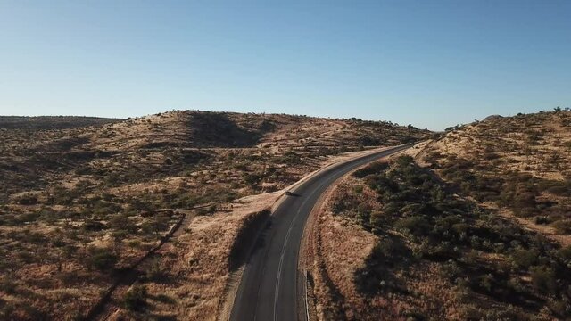 4K aerial drone video of Africa savanna hills, B1 highway among mountains south of Windhoek in central highland Khomas Hochland of Namibia, southern Africa