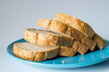 Whole wheat bread on a Blue Plate, Vintage Sweet tone.