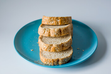 Whole wheat bread on a Blue Plate, Vintage Sweet tone.