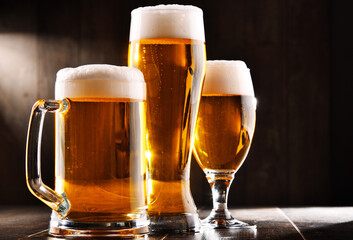Composition with three glasses of lager beer
