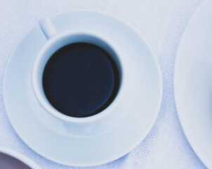 white cup of coffee