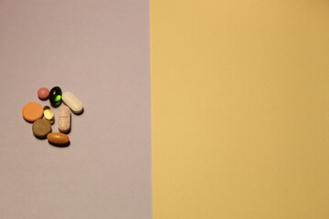 yellow space for content with medicine tablets on the left side.