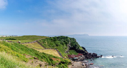 coast of volcano of seongsan Ilchulbong on jeju island, panorama view.