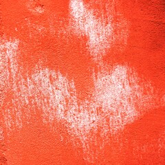 red and white paint on a wall.  grunge  backdrop