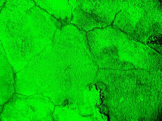 bright green cracked wall texture. green background