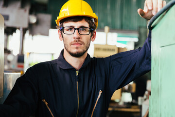 Portrait of Industry factory maintenance engineer wearing uniform and safety helmet. Industry, Engineer, construction concept.