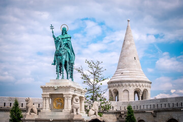 Fototapeta premium monument of Saint Stephen - the first king of Hungary in front of Fisherman's Bastion in in Buda Castle, Budapest, Hungary. Square image