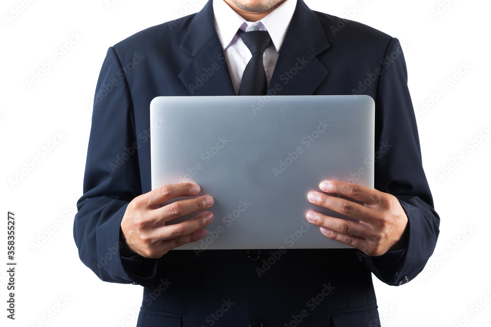 Wall mural business man holding laptop isolated on white background