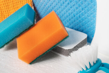 Cleaning services for cleaning the premises. Sponges, rags, brushes on a white background