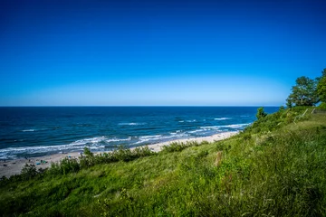 Foto op Plexiglas Sunny beach by the sea. Blue sky © DK-ART