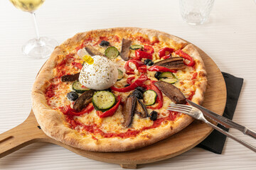 Pizza with mozzarella and vegetable
