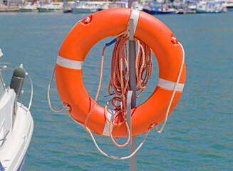 Lifebuoy hanging on the powerboat