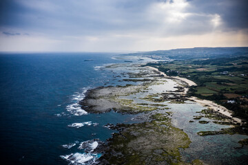 Fototapeta na wymiar 鹿児島の徳之島の海岸をドローンで俯瞰撮影した写真。大砲の跡が所々にある