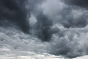 Heavy dark grey rainy clouds in the sky