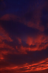 Fototapeta na wymiar dramatic sky with orange clouds after sunset