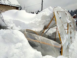 The greenhouse broke down under the weight of snow in winter