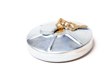 Detail of a car for replacement during repair - gas tank hatch with an inserted key and a lock on a white isolated background in a photo studio for sale in a store.