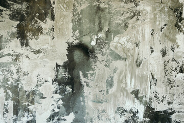 The texture of the old gray concrete wall for the background in the loft style with scuffs and...