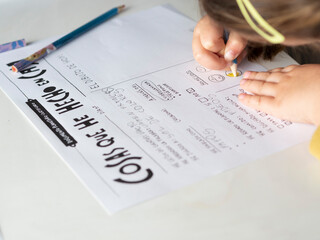 GIRL DOING SCHOOL DUTIES