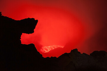 Breathtaking view over amazing red lava lake boiling in crater of active Erta Ale volcano at Danakil depression, Ethiopia
