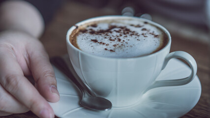 Drinking Of Hot Cappuccino Coffee