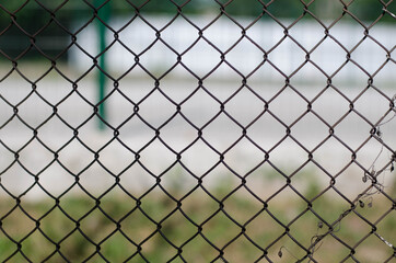 Metal grid. Iron wire. Fence from the net.