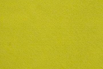 Obraz premium Lemon yellow textured felt fabric material background
