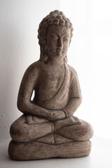 buddga figure in room interior