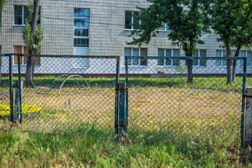 Old abandoned fence on the street