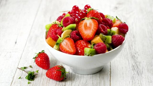 mixed fresh fruit salad in bowl