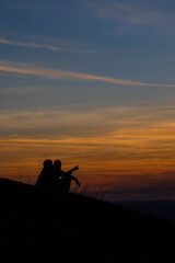 Fototapeta na wymiar silhouette of a man on the sunset