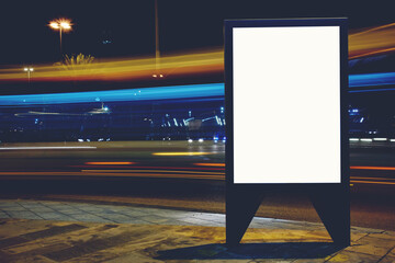 Illuminated blank billboard with copy space for your text message or promotional content,...