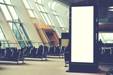 Blank empty digital billboard for your advertising on publicity content in airport waiting hall. Mock up electronic media board with copy space for your design information in terminal interior