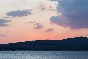 Sunset over the sea. Sunset at sea. Sea Waves. Ocean waves. Black Sea, Gelendzhik.