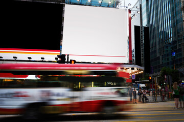 Publicity mock up area for advertising or commercial information Lightbox on exterior of modern buildings in downtown,blank billboards with copy space on skyscraper facade in business district of city © BullRun