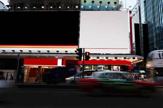 Publicity mock up area for advertising or commercial information Lightbox on exterior of modern buildings in downtown,blank billboards with copy space on skyscraper facade in business district of city