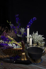 Wiccan altar with instruments and ingredients