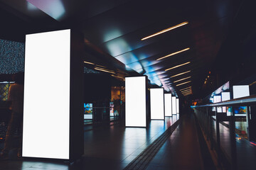 Digital billboards with clear copy space screen background for your text message or information content, electronic banner in night city, empty poster in metro setting, blank advertising mock up