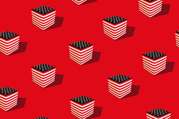Flat lay colorful pattern with american flag cube on red background. Trendy mockup or wallpaper. Minimal July 4th USA independence day concept with sharp shadows.
