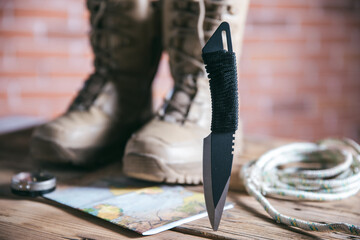 traveling shoe and knife on table