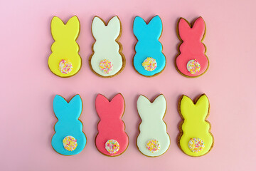 funny bunny cookies on pink background